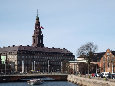 danish parliament building (Christiansborg Palace) viewed from Holmens Canal. The palace inhouses the Prime Ministers office and the Supreme Court of Denmark.