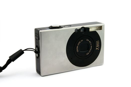 frontal view of a point and shoot digital camera