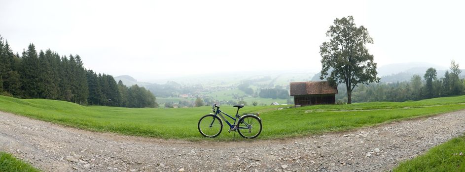 An image of a bicycle on the village road