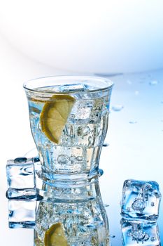 cold soda drink with ice and lemon