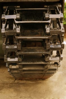 close up image of an old military tank wheel.