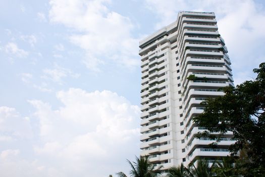 Condo high in the sky. Trees, nature With a satellite dish.