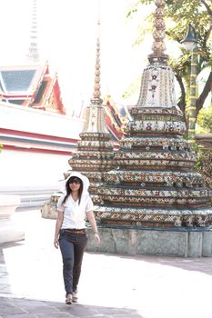 thai girl travel in the thai temple,she in bangkok