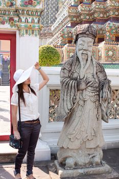 thai girl travel in the thai temple on holiday