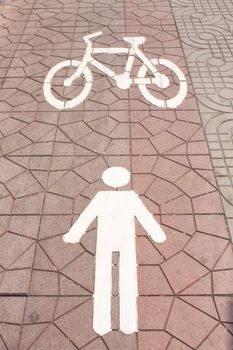Symbol that is pedestrian for walking and cycling.
