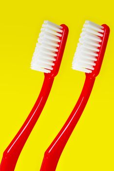 Toothbrush on yellow background