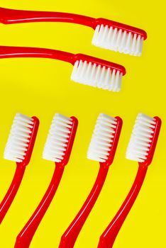 Toothbrush on yellow background