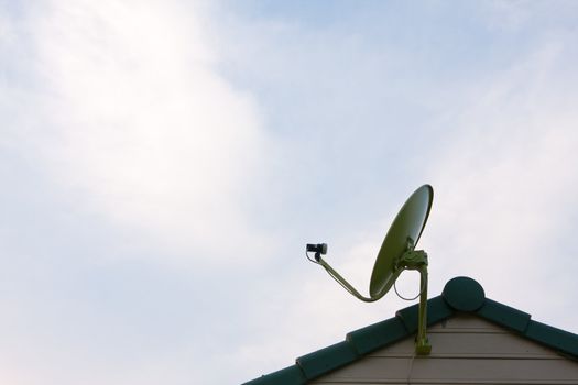 Satellite dish on the roof. For receiver because the signal on his little