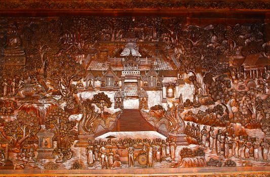 ancient mural wood carving from Thailand.