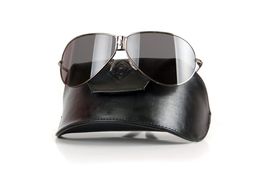 Modern black sunglasses isolated on a white