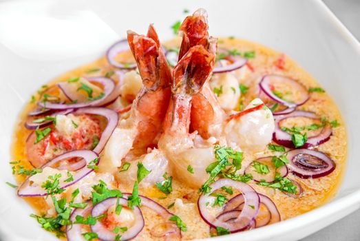 King shrimps with vegetables at cream sauce