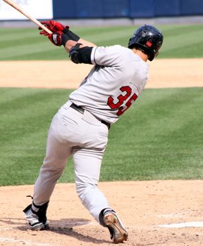 Baseball batter swinging