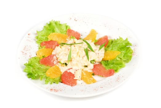 seafood salad of shrimp baked at cream with orange and grapefruit isolated on a white background