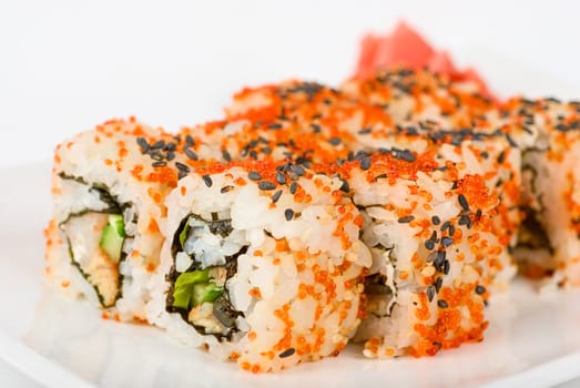 Sushi rolls at plate isolated on a white