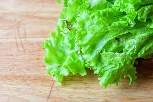 ripe lettuce on the wood table