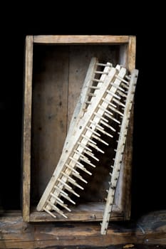 Stock photo: an image of garden rakes in old wooden box