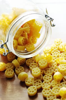 An image of yellow pasta on the kitchen table