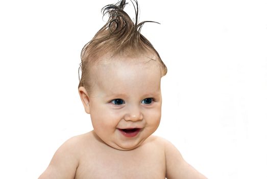 Happy little boy with a hairstyle isolated on a white background.