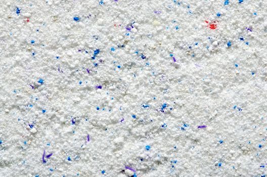 Washing powder texture with blue and red disseminations