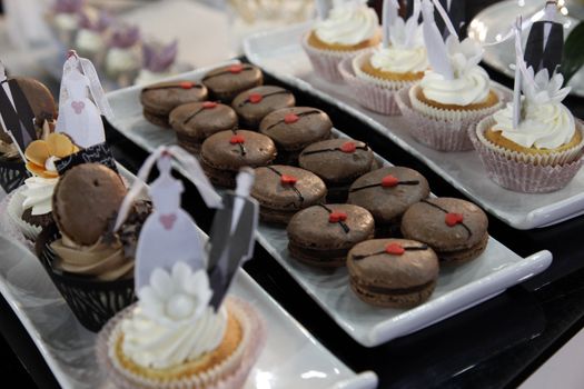 Colorful desserts and pastry served on a wedding party