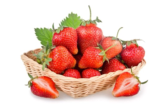 Basket of red strawberry fruits with green leaves isolated on white background 