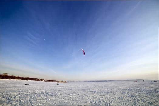 the Ski kiting on a frozen lake