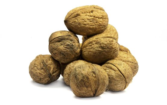 bunch of wallnuts on a white background