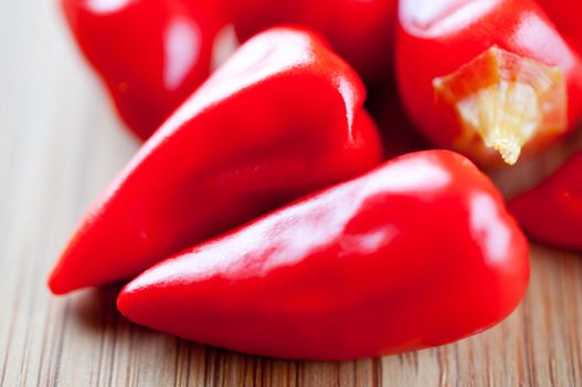 Canned chili pepper on a cutting board close up