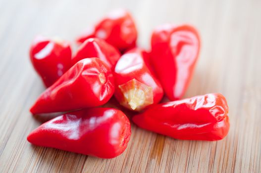 Red chili pepper on a cutting board close up