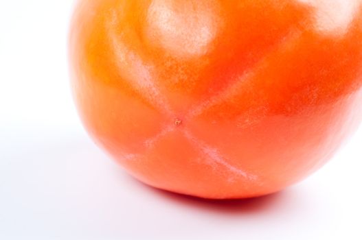 Persimmon on white background close up