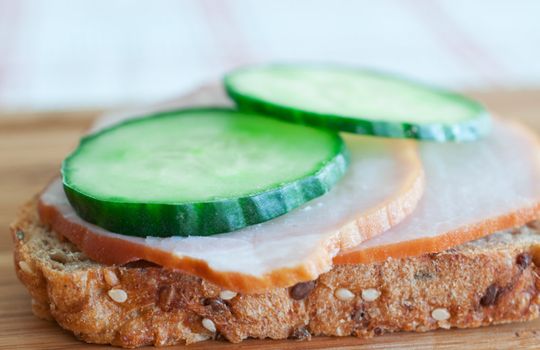 Sandwich with ham and cucumber  close up