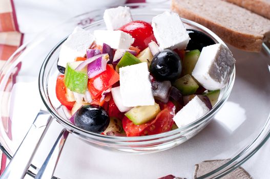 Mediterranean salad with goat cheese close up