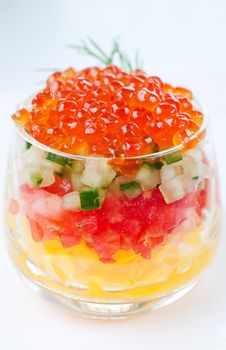 Caviar with vegetable salad on plate
