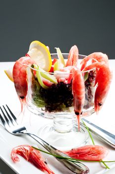 Shrimp cocktail prawn seafood salad in a salad bowl