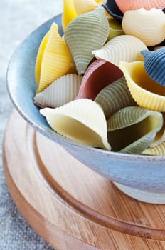 Pasta in bowl on a coarse cloth