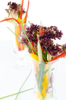 Vegetables in a glasses close up