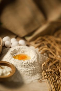 Focus play with an egg volcano on a wooden table