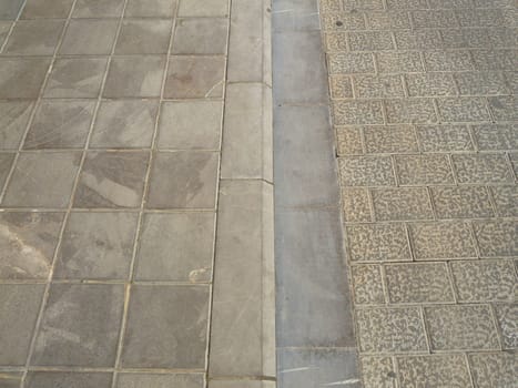 kerb stone between pavement and a road