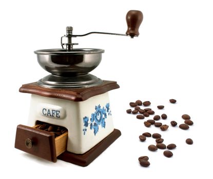 Vintage coffee mill with coffee beans