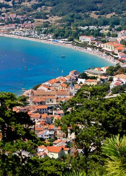 Adriatic town of Baska vertical aerial view, Krk island, Croatia