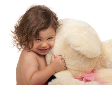 Child hugging his bear