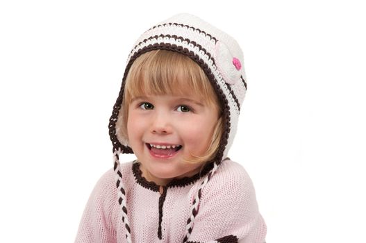 Cute child with knitted hat and cardigan