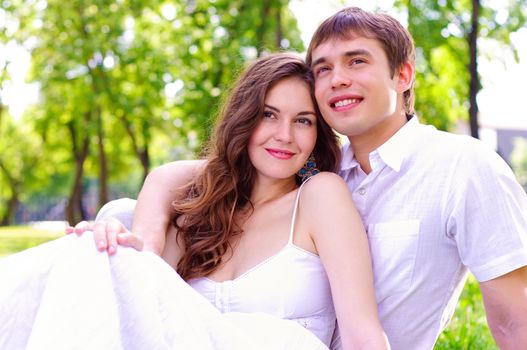 couple hugging in the park, have a good time together