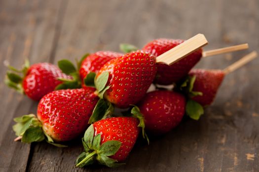 Strawberries on a stick make a healthy snack