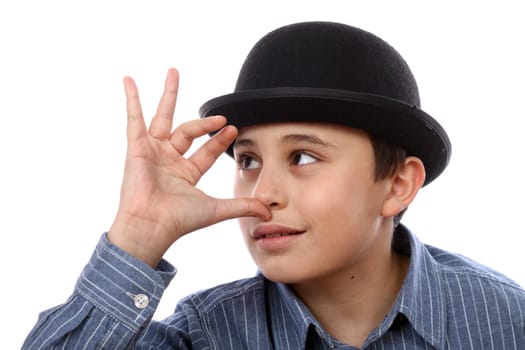 Boy with bowler hat mocking over white