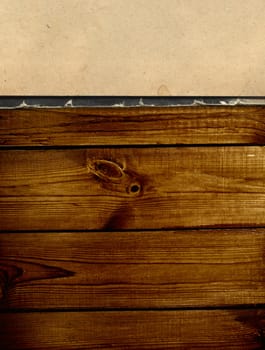 Old book on wooden planks