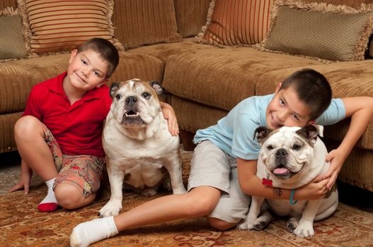 Brothers and their pet dogs in their home