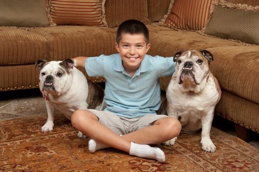 Boy with his pet dogs