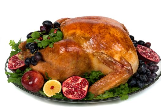 Beautifully decorated golden roasted turkey.