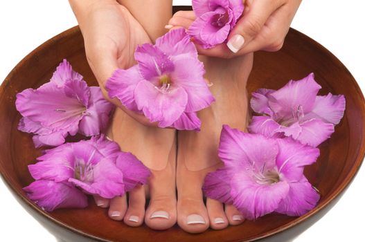 Pedicure and manicure spa with beautiful flowers